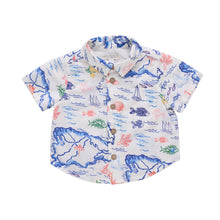 Load image into Gallery viewer, Children's shirt with ocean-themed print on a light gray background