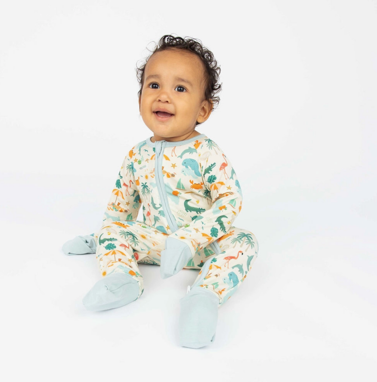 Baby pajamas by Emerson and Friends featuring Explore Florida souvenir design, made of bamboo, convertible for comfort.