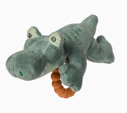 Mary Meyer baby alligator teether rattle with soft fabric body and plastic teething parts for gentle soothing and sensory play.