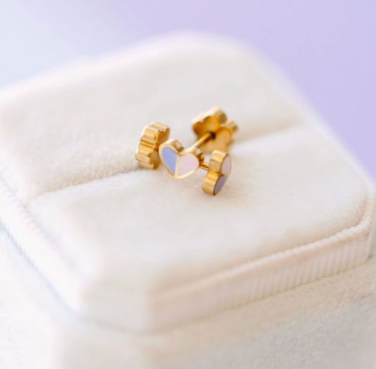 Micro heart screw back earrings by Pierced Co, small silver stud earrings with heart-shaped design and secure screw back closure.