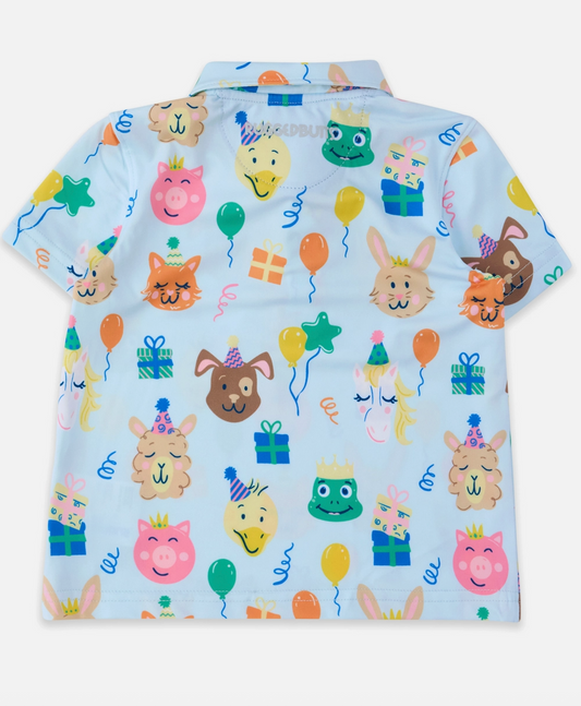 Boys wearing Ruffle Butts birthday party animals knit short sleeve performance polo shirt with colorful animal print design.