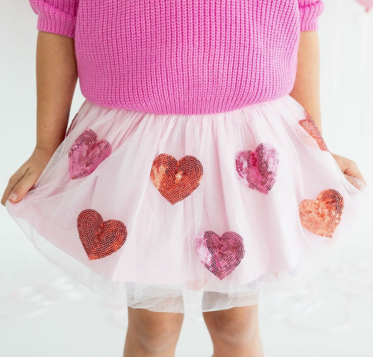 Girls' sequin heart Valentine's Day tutu skirt by Sweet Wink, featuring a pink tulle design with sparkling sequins and a heart embellishment.