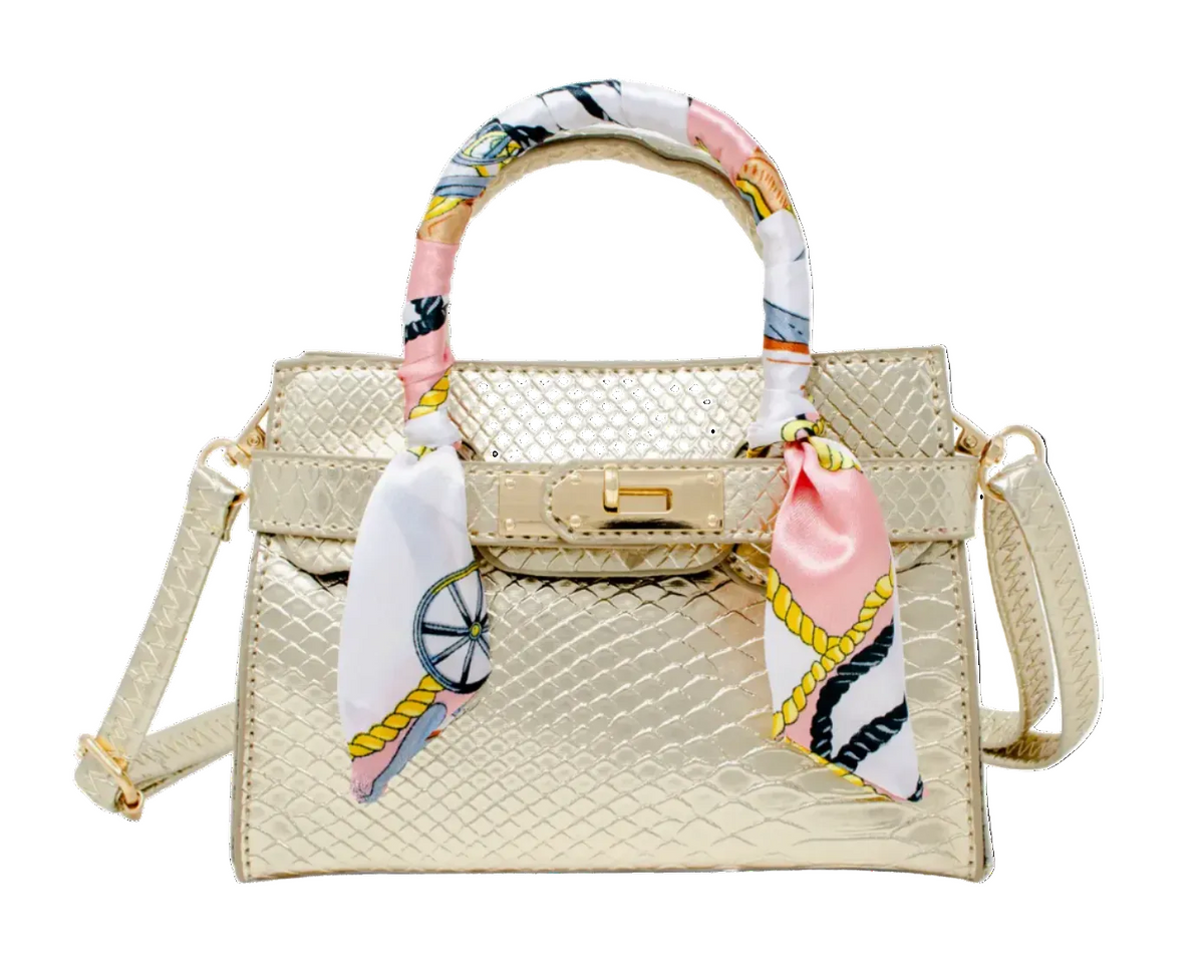 Gold crocodile-pattern scarf handbag by Tiny Treat and Zomi Gems, featuring textured crocodile skin design and elegant gold finish.