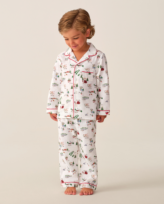 Cute kid's twill pajama set from Petite Plume's North Pole Chronicles collection, featuring festive holiday-themed fabric and comfortable fit.