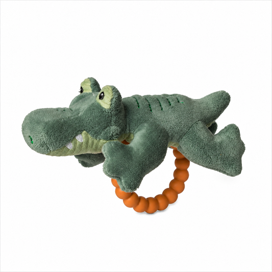 Baby alligator teether rattle by Mary Meyer with soft fabric and plastic parts, designed for soothing and entertainment.