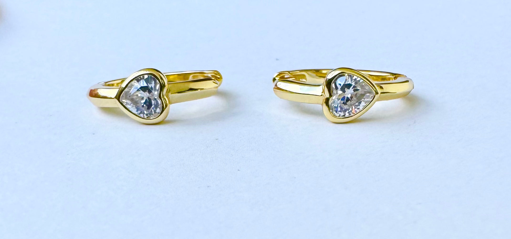 Kids Heart Hoop Earrings in gold by Jack and Jewelz, featuring small, shiny heart-shaped hoops for children.