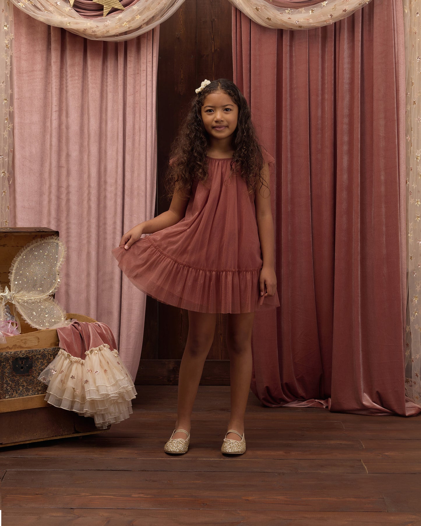 Girls Edie Dress in Spice by Noralee, featuring a stylish and comfortable design, shown on a young girl with floral details.