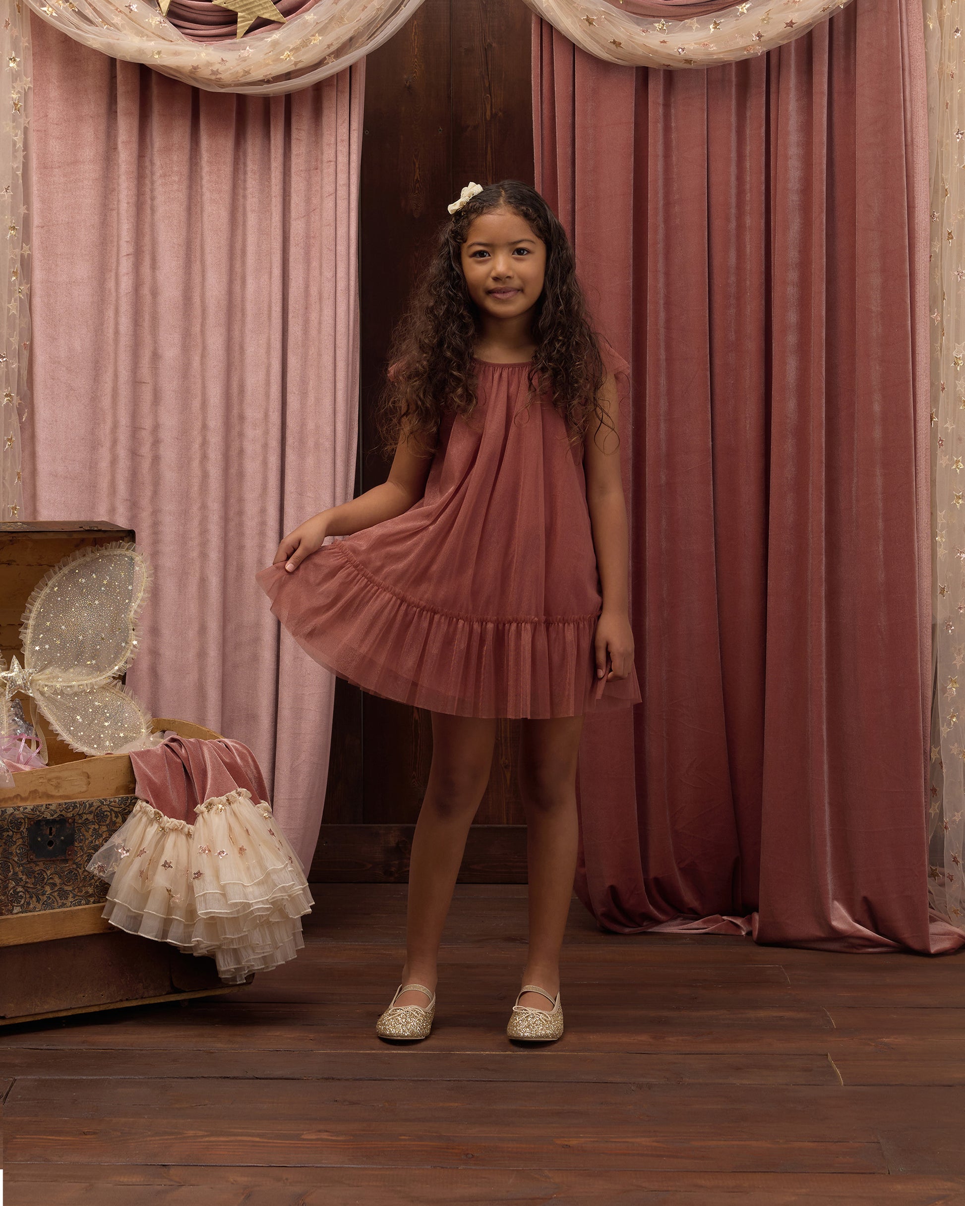 Girls Edie Dress in Spice by Noralee, featuring a stylish and comfortable design, shown on a young girl with floral details.