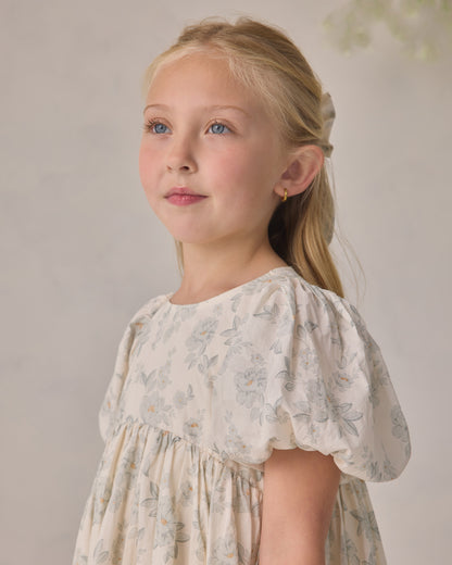 Noralee Luna Dress Mist with English Rose floral print, showcasing delicate pink roses and soft fabric in a studio setting.