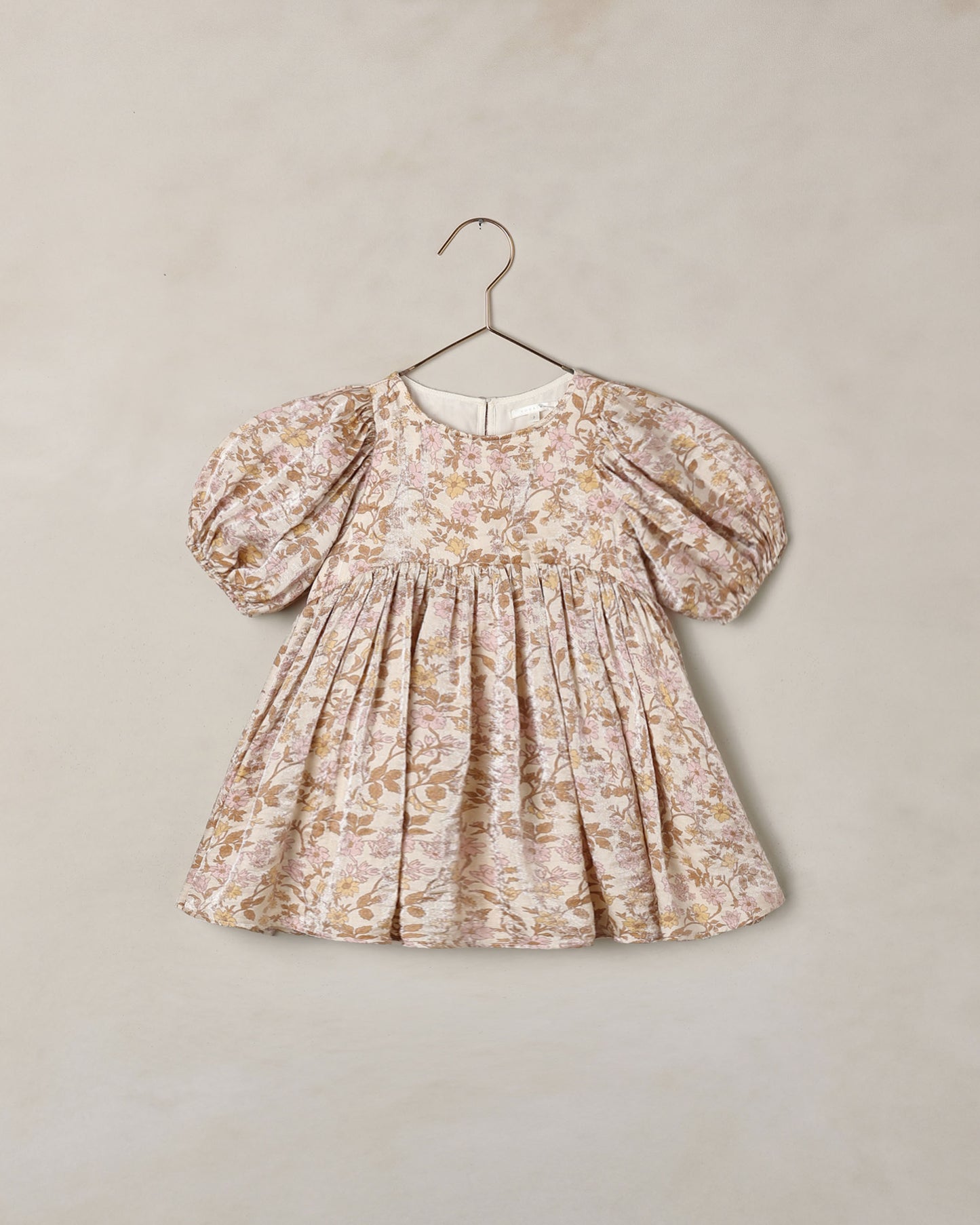 Girls shimmering Luna dress in wildflower print by Noralee, featuring a flowing design and vibrant floral pattern.