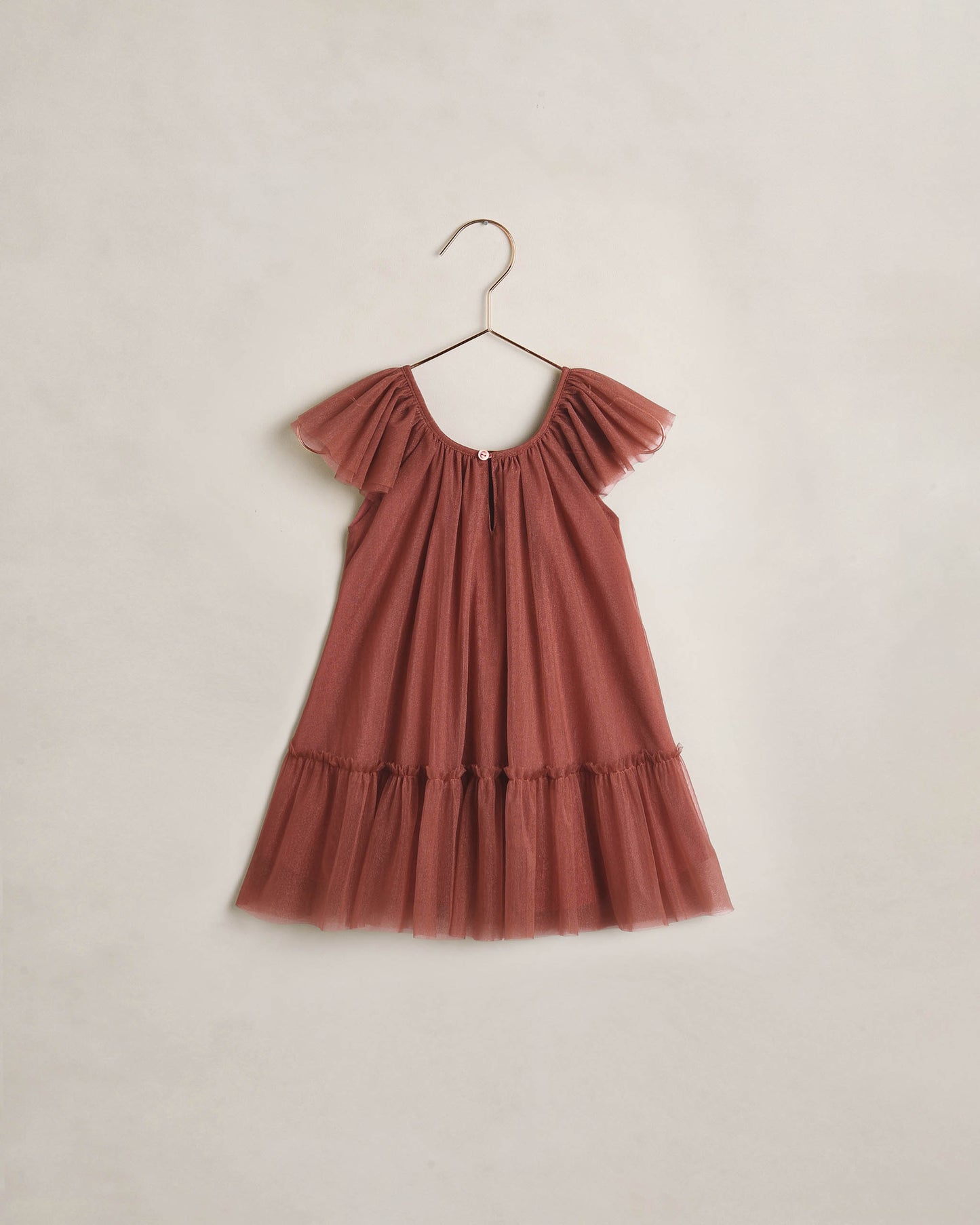 Girls Edie dress in spice by Noralee, featuring a stylish, colorful design with a comfortable fit and playful details.