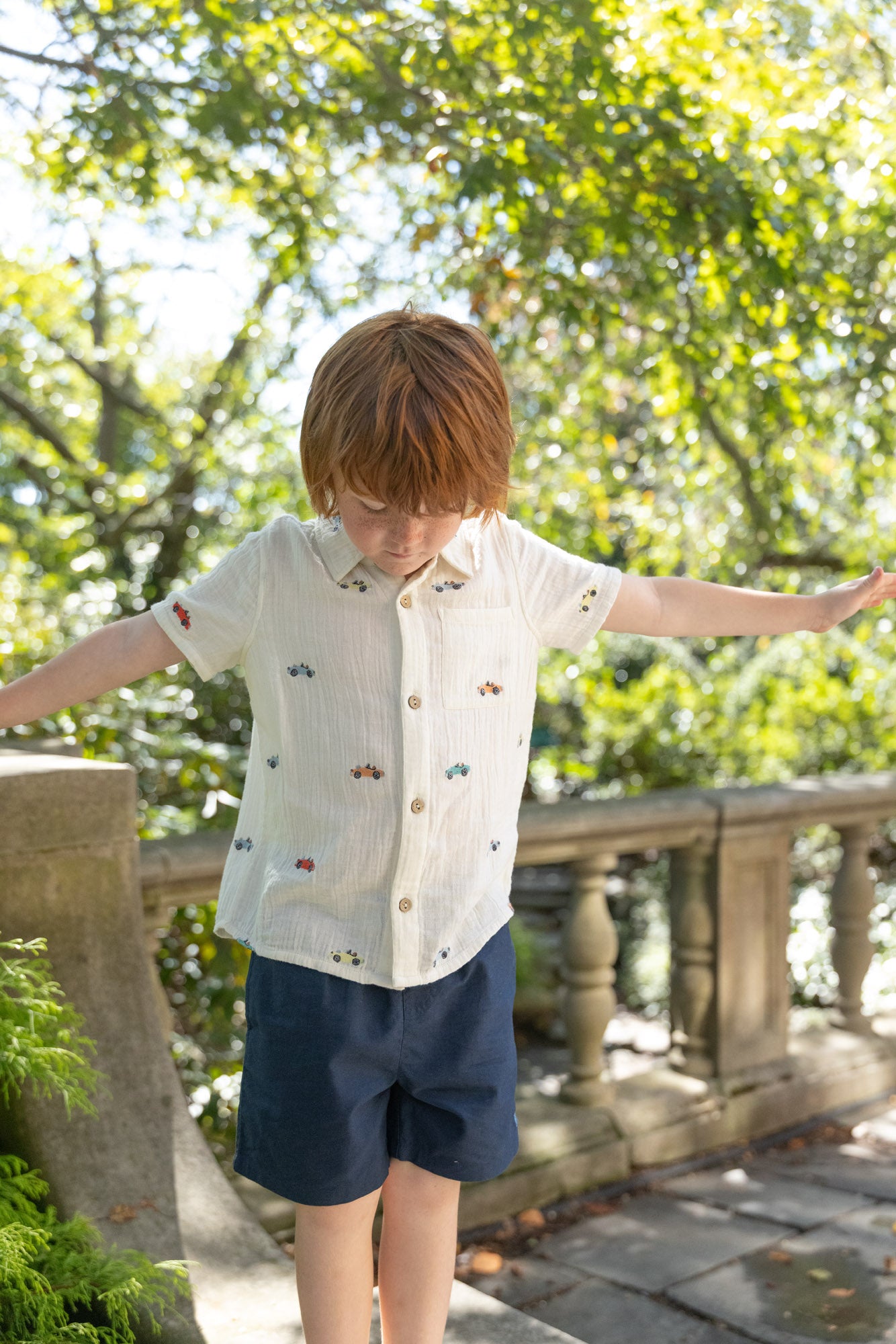 Pink Chicken boys button-down Jack shirt with vintage car embroidery, featuring colorful automotive design on soft fabric.