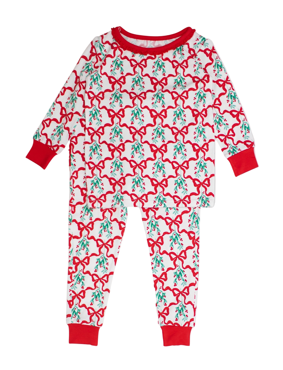 Children's pajama set with red bows and green leaves on a white background