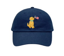 Load image into Gallery viewer, Navy blue cap with a embroidered dog holding an American flag on a white background
