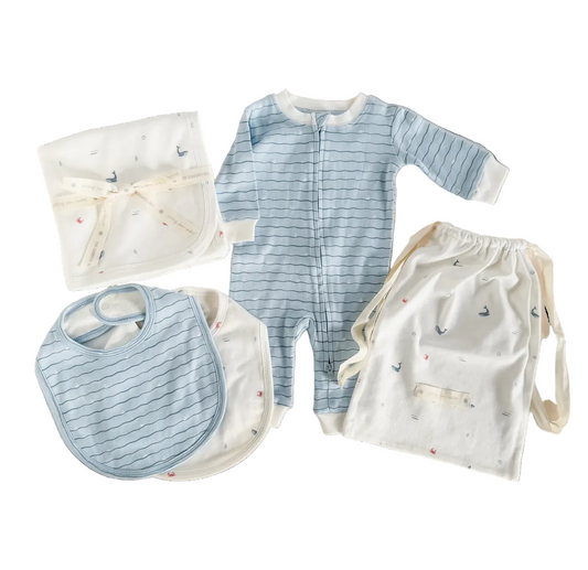 Nautical ocean-themed baby layette set made of organic cotton from The Blueberry Hill, perfect for a baby shower gift.