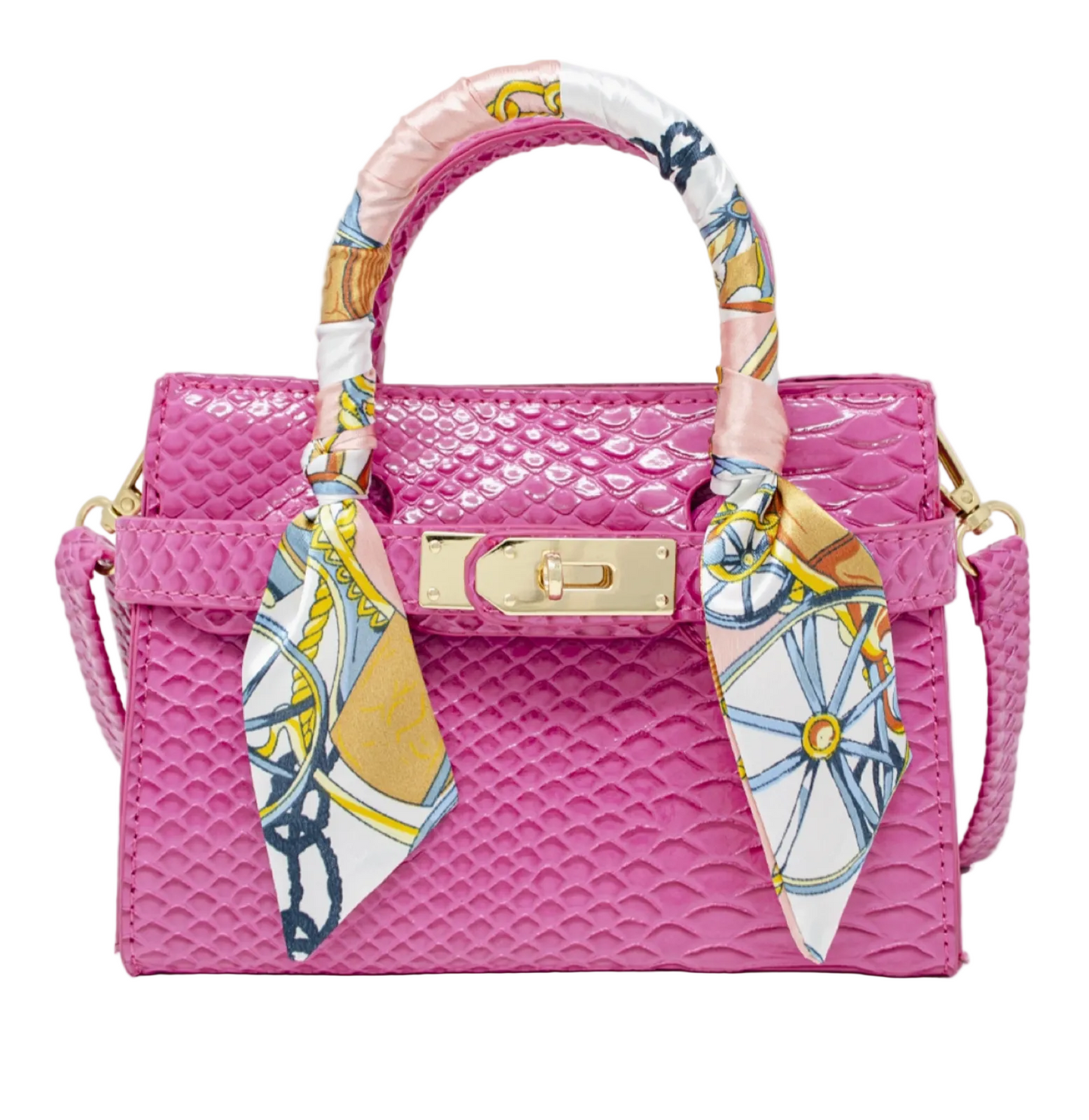A pink textured leather handbag with a gold clasp and a patterned silk scarf wrapped around the top handle, shown against a plain white background.
