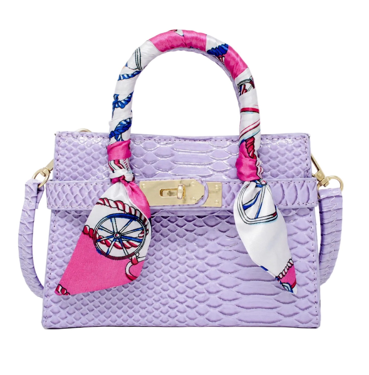 A light purple textured handbag with a gold clasp and a pink, white, and blue patterned silk scarf wrapped around the handle, shown on a plain white background.