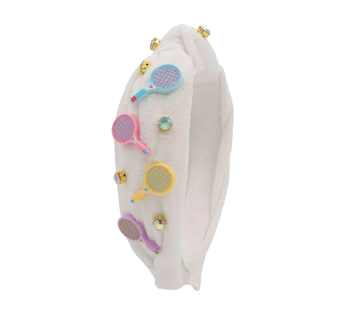 A white plush headband decorated with colorful miniature tennis rackets and small gold-tone rhinestone-like studs, shown on a plain white background.
