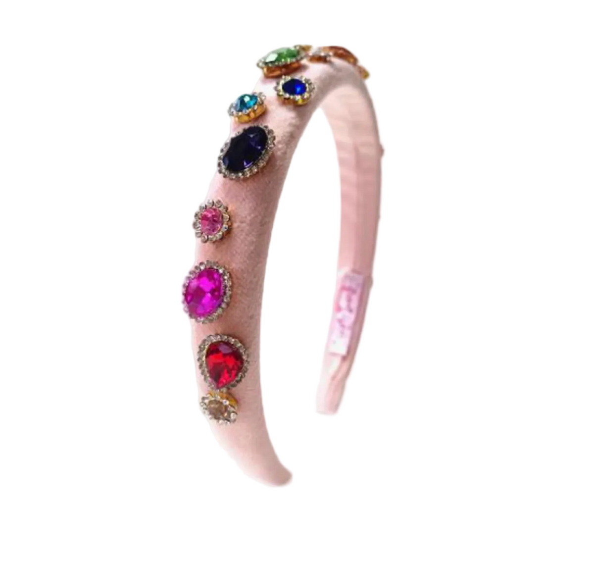 A light pink velvet headband decorated with a row of colorful rhinestone-embellished oval and round gems, shown against a plain white background.