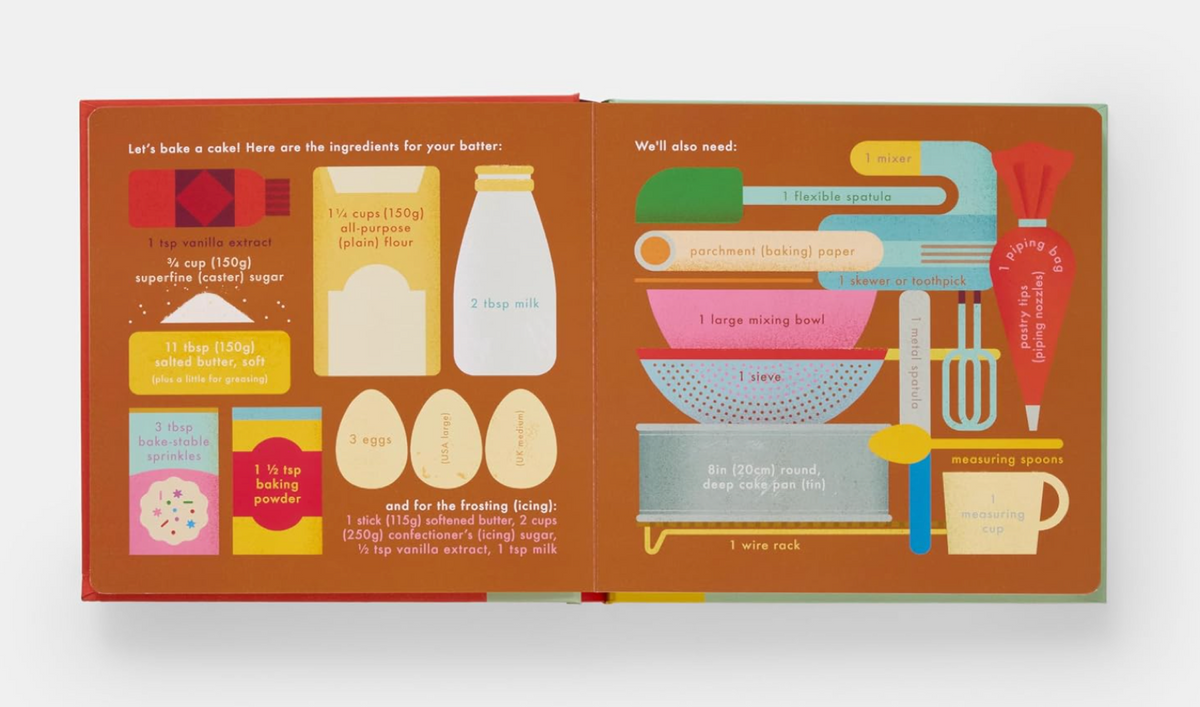 Interactive recipe book titled "Cake! Cook in a Book" by Ingram, showing colorful pages with cake baking instructions.