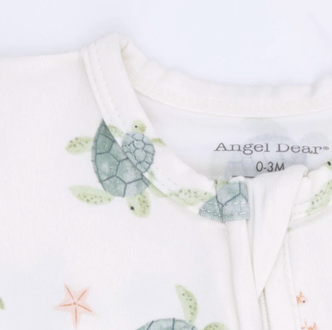 Angel Dear Sea Turtle 2-Way Zip Baby Footie in soft fabric with sea turtle print for infants aged 0-3 months.