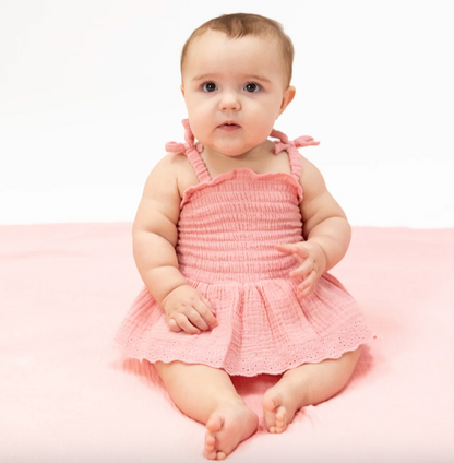Angel Dear solid muslin pink smocked bubble with matching skirt for babies, featuring soft fabric and delicate detailing.
