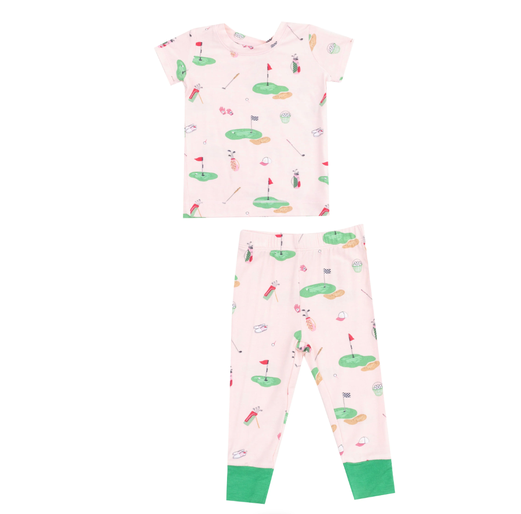 Angel Dear pink pajama set for kids featuring golf-themed print and soft, comfortable fabric, perfect for bedtime.