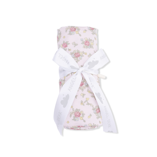 Angel Dear Edith's Rose Garden swaddle blanket featuring a soft pink floral pattern on lightweight fabric.