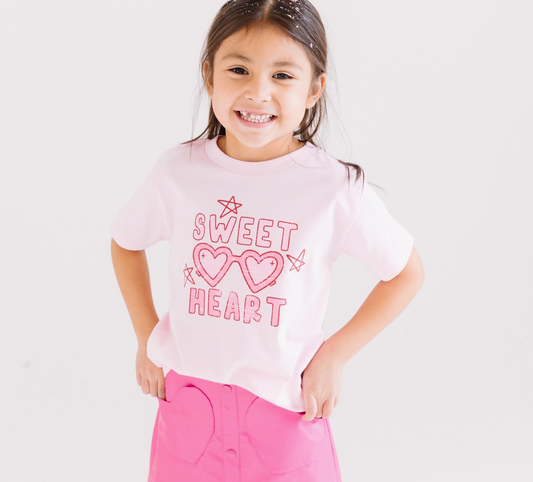 Kids' Valentine's Day shirt by Benny & Ray Apparel featuring a sweet heart design on soft fabric.