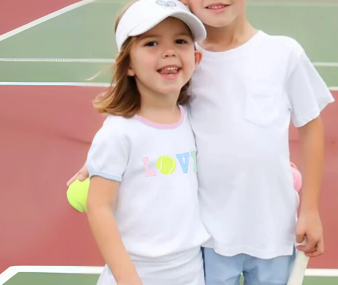 Girls' LOVE Tennis Tee by bits and bows, featuring playful design and comfortable fit for young tennis enthusiasts.