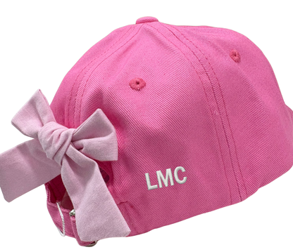 Girls rainbow unicorn embroidered bow baseball hat by Bits and Bows featuring colorful unicorn design and stylish embroidered bow.