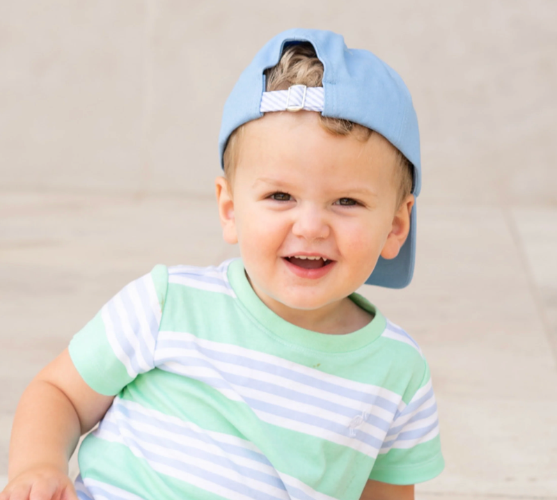 Light blue kids' embroidered hockey baseball hat by Bits and Bows, featuring a sporty design and adjustable strap.