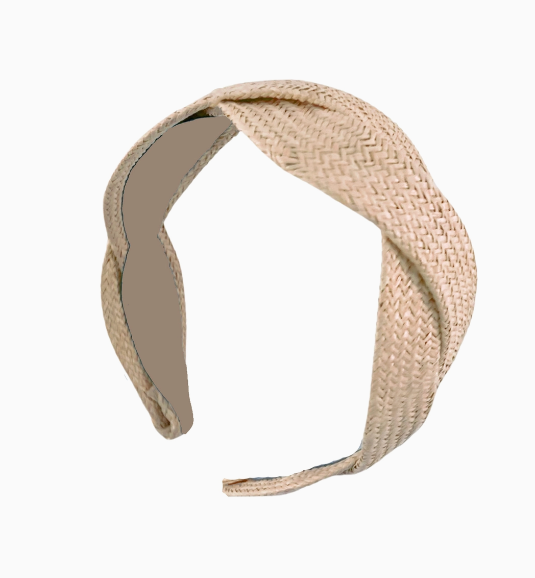 Natural Seaside Waves headband by bits and bows, featuring a blue and white wave pattern, styled with a soft fabric headband.