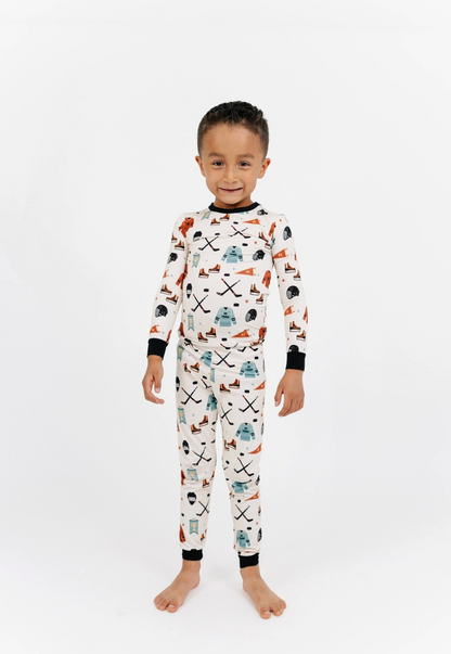 Emerson and Friends Hat Trick Hockey print bamboo pajamas set featuring a comfortable, soft fabric and hockey-themed design.