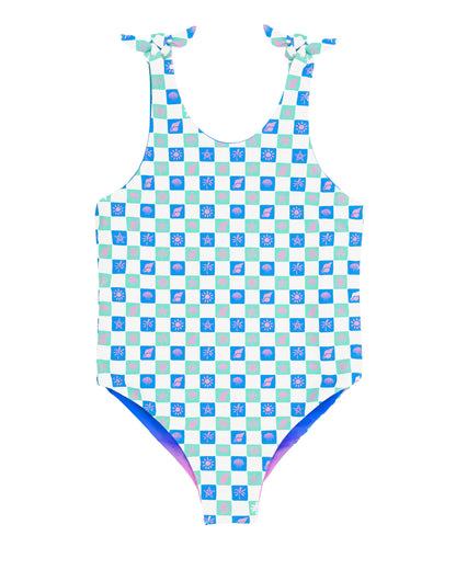 Feather 4 Arrow Skye reversible one-piece swimsuit showing both patterned and solid sides on a mannequin.