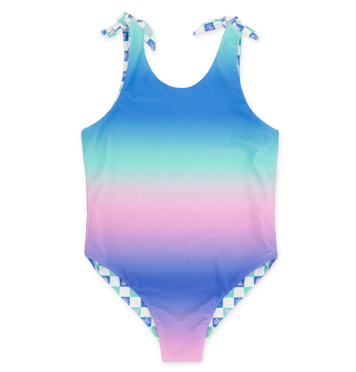 Feather 4 Arrow Skye reversible one-piece swimsuit with floral and solid patterns, shown on a model in a sunny outdoor setting.