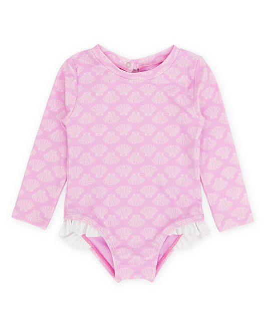 Girls long sleeve one-piece swimsuit by Feather 4 Arrow featuring a playful pop pink shell print.