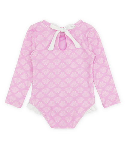 Girls long sleeve one-piece swimsuit by Feather 4 Arrow in pop pink with shell pattern for 6-12 months.