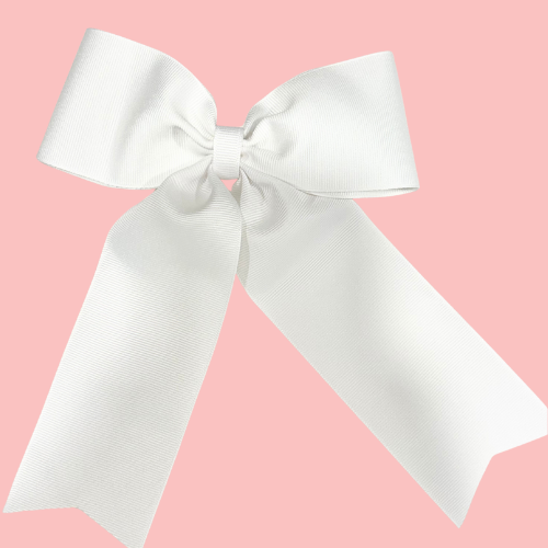 Large personalized embroidered bow with alligator clip by Flora Ottimer, featuring vibrant red fabric and intricate embroidery detail.