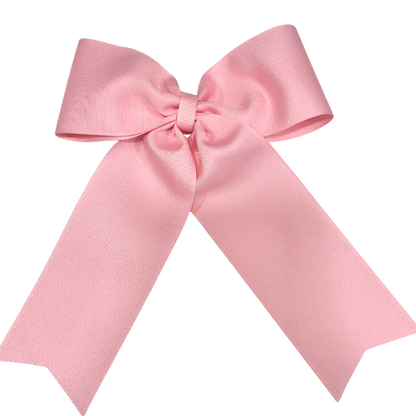 Large personalized embroidered bow with alligator clip by Flora Ottimer, red fabric, decorated with custom embroidery.