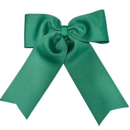 Large personalized embroidered bow with alligator clip from Flora Ottimer, featuring red fabric and intricate embroidery detail.