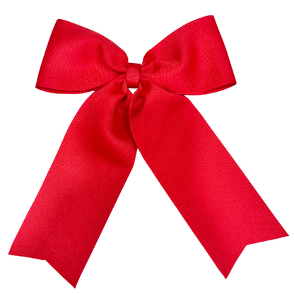 Large personalized embroidered bow with alligator clip by Flora Ottimer, featuring red fabric and custom embroidery details.