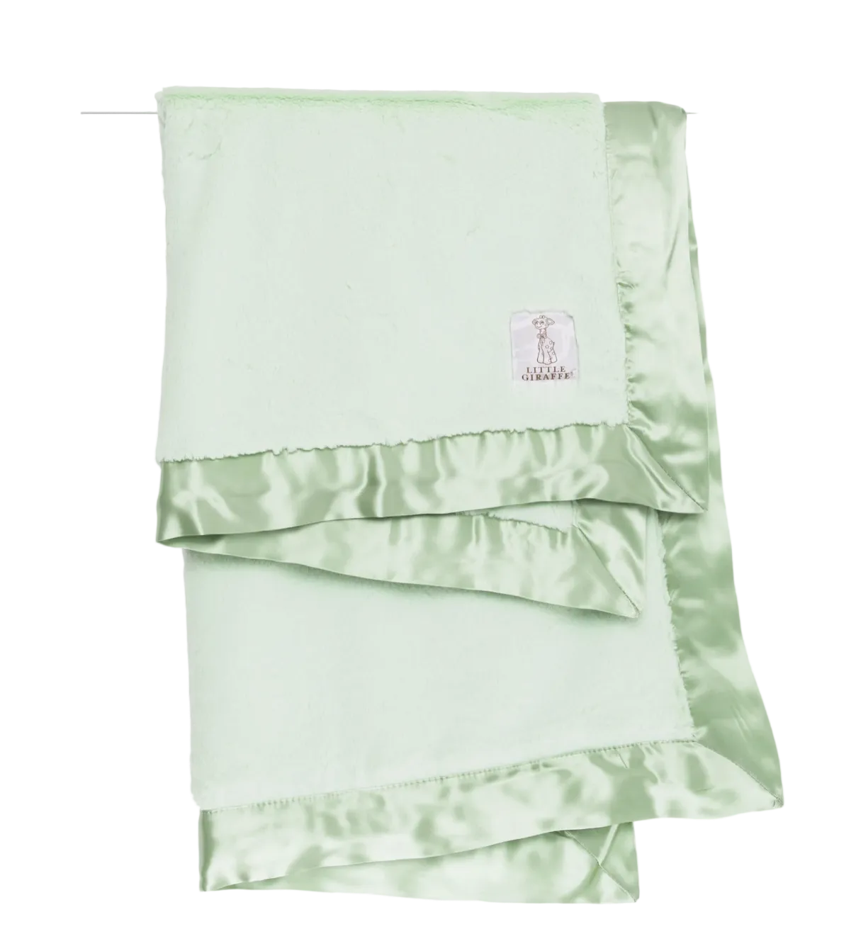 Soft sage green Little Giraffe Luxe baby blanket with plush fabric and elegant stitching, perfect for cuddling and comfort.