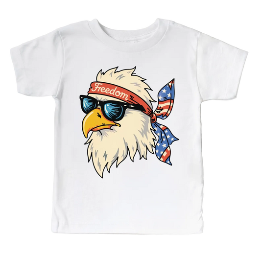 Kids patriotic eagle Freedom T-shirt by Mad Mooshi featuring a bold eagle design and American flag elements on soft cotton fabric.