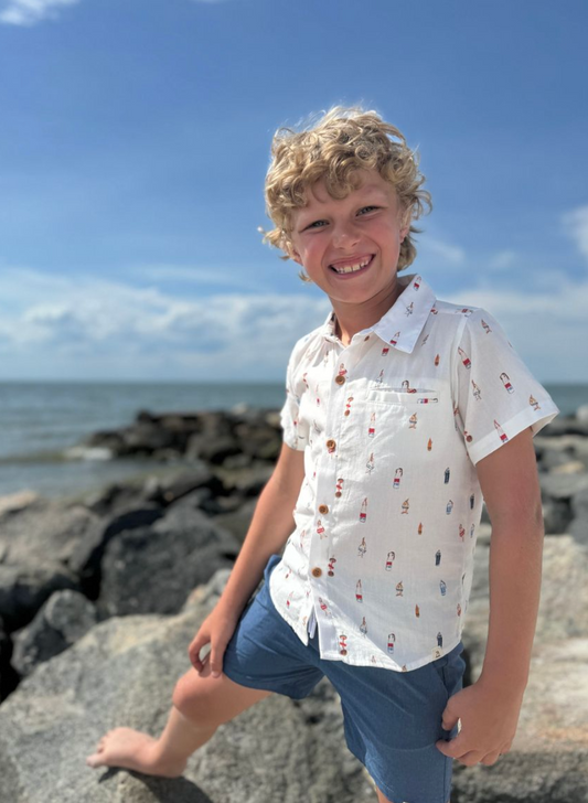 Me & Henry Maui printed button-down shirt featuring vibrant tropical floral pattern and relaxed fit.