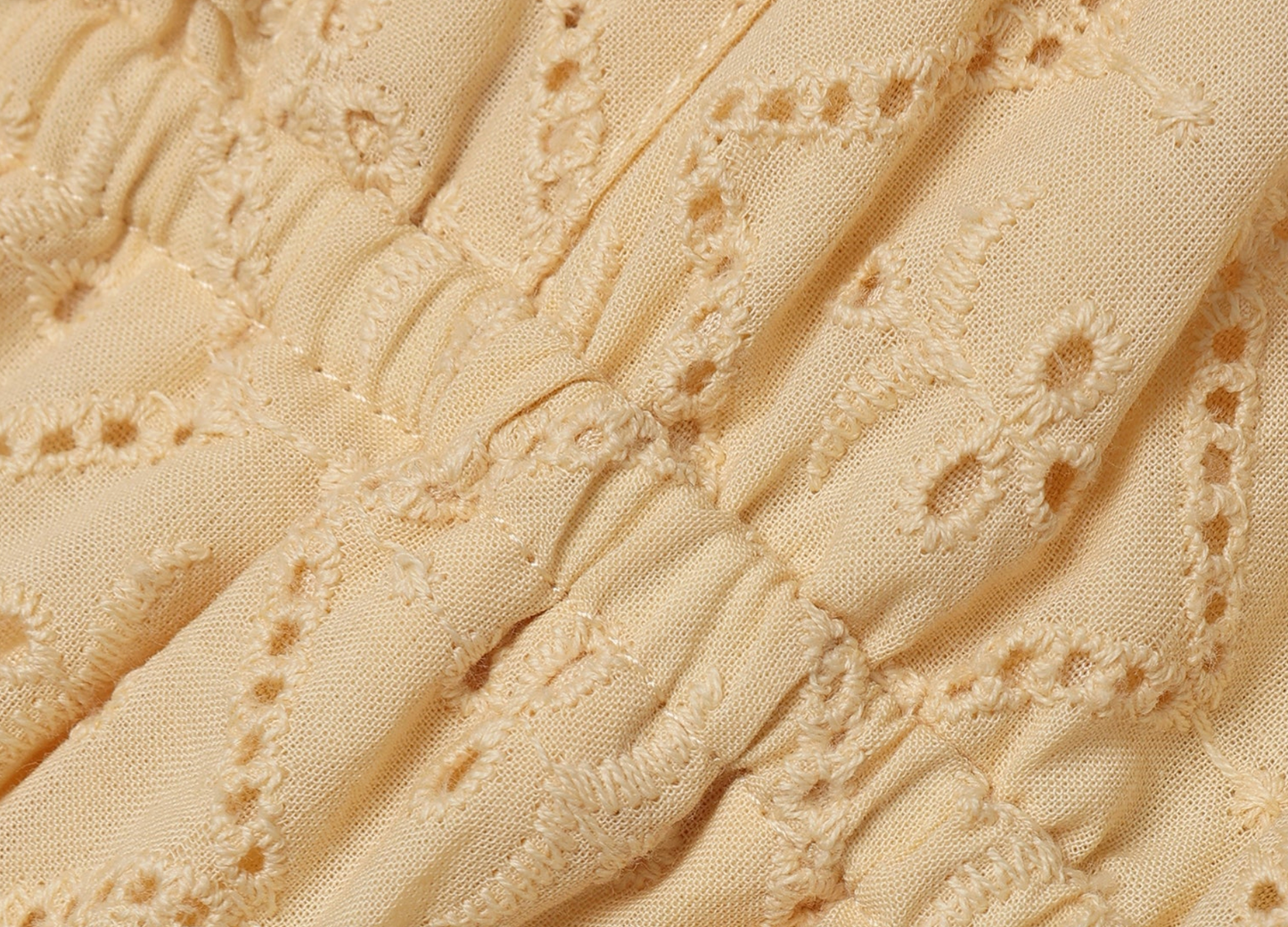 Baby Lucy eyelet romper in lemon by Noralee, featuring delicate eyelet fabric and a sweet, cheerful design for infants.