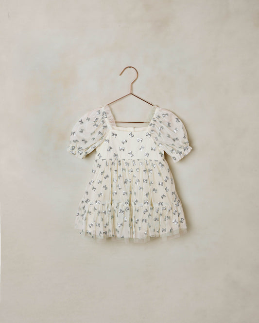 Noralee Louella Dress with sequin bows in natural color, featuring a stylish design and decorative sequins on the front.