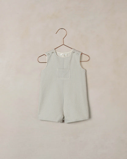 Boy's Georgie Romper in Sky Stripe by Noralee, featuring a cute sleeveless design with blue and white stripe pattern.
