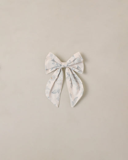 Everly Bow Mist in English Rose by Noralee, featuring a soft ivory bow and elegant floral design.
