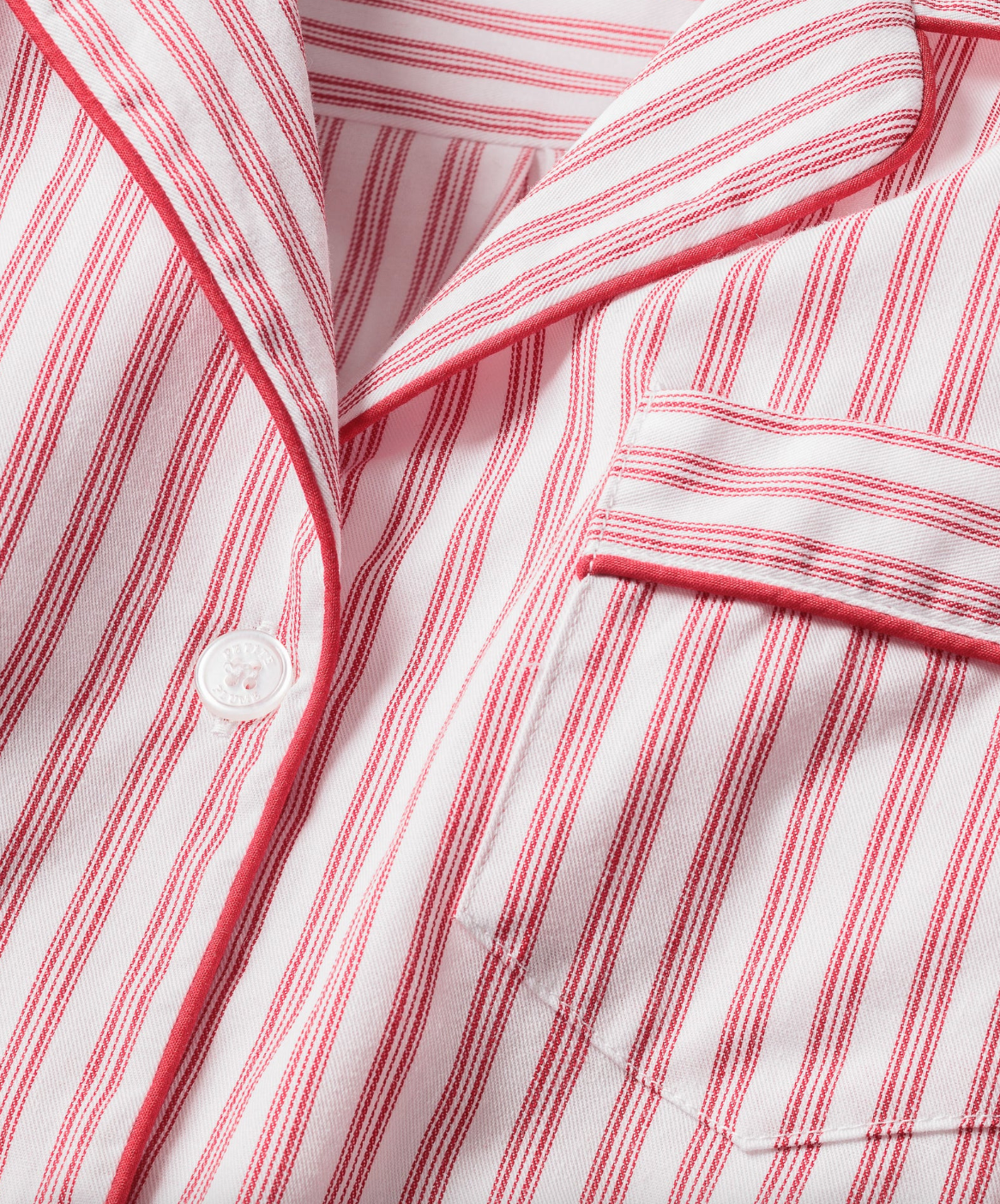 Women’s antique red ticking pajama set by Petite Plume, featuring a cozy button-up top and matching pants with classic ticking pattern.